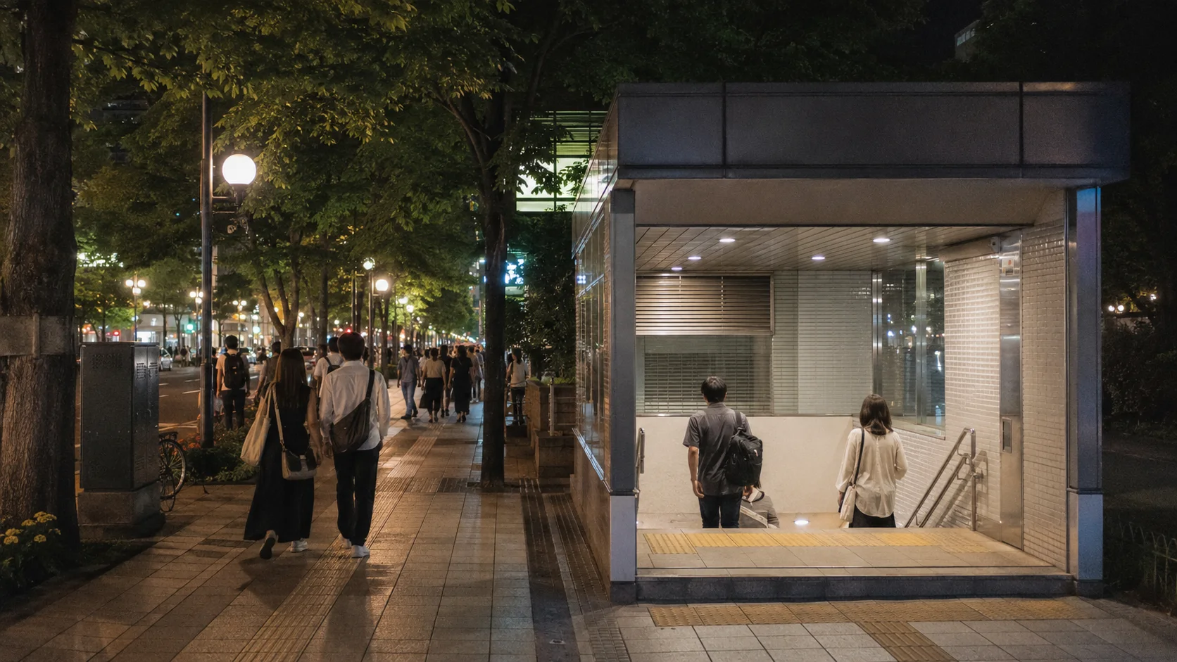 Night walking route and generic subway entrance after an outdoor summer event in central Sapporo