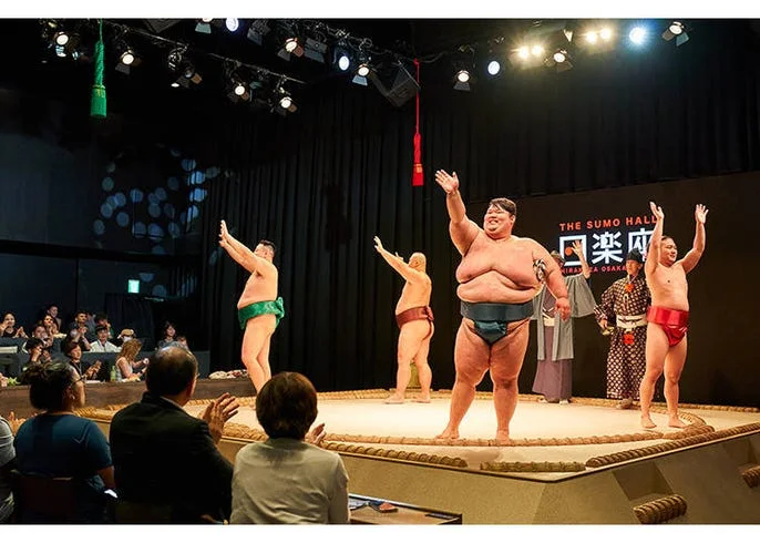 Sumo performance on the stage at THE SUMO HALL HIRAKUZA OSAKA in Namba