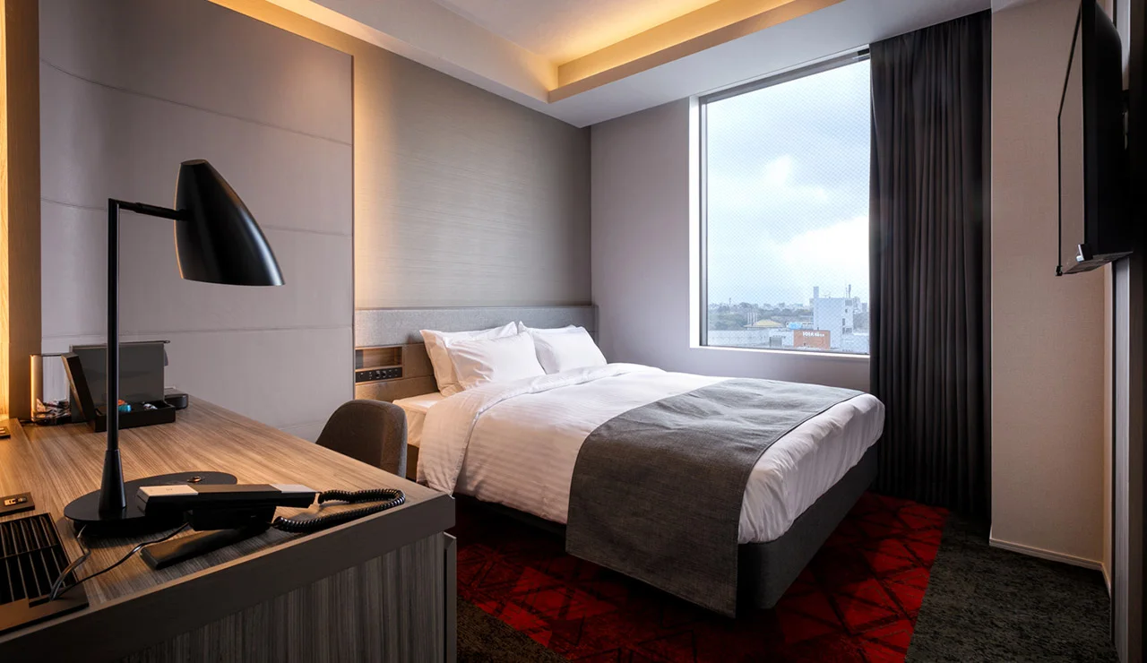 Hotel JAL City Fukuoka Tenjin room for shopping and repacking near Akasaka