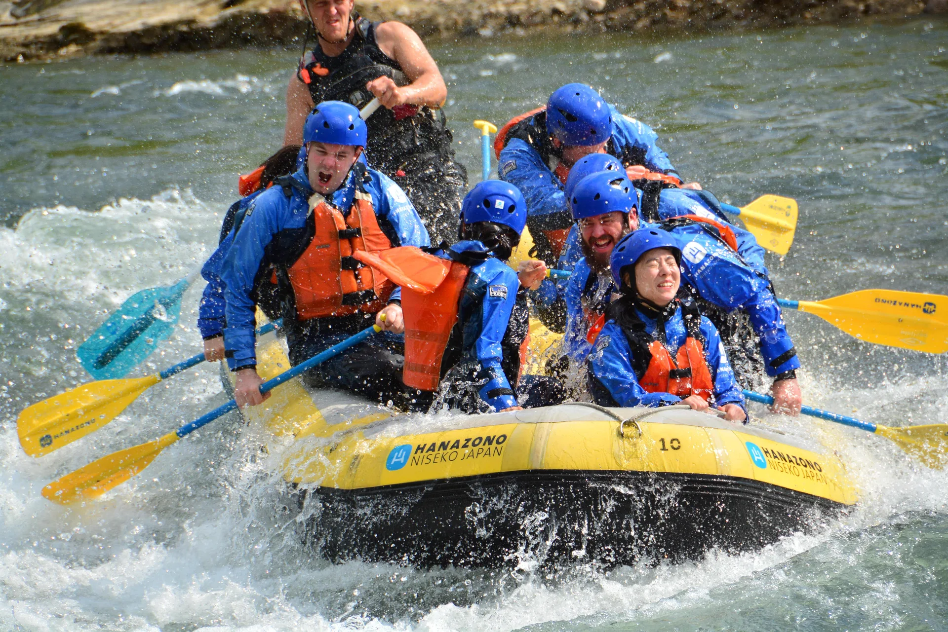 Whitewater rafting on the Shiribetsu River in Niseko; a shared raft and a private boat can run similar water, so price alone does not determine intensity.