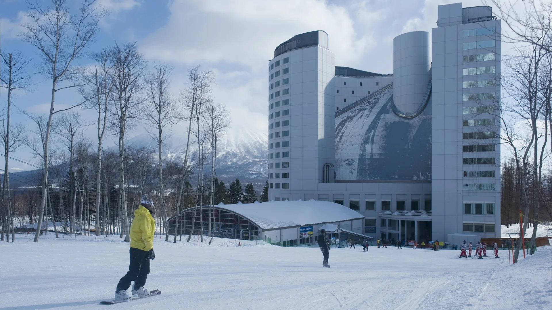 Snow route beside a Niseko property used to identify the marked run or lift