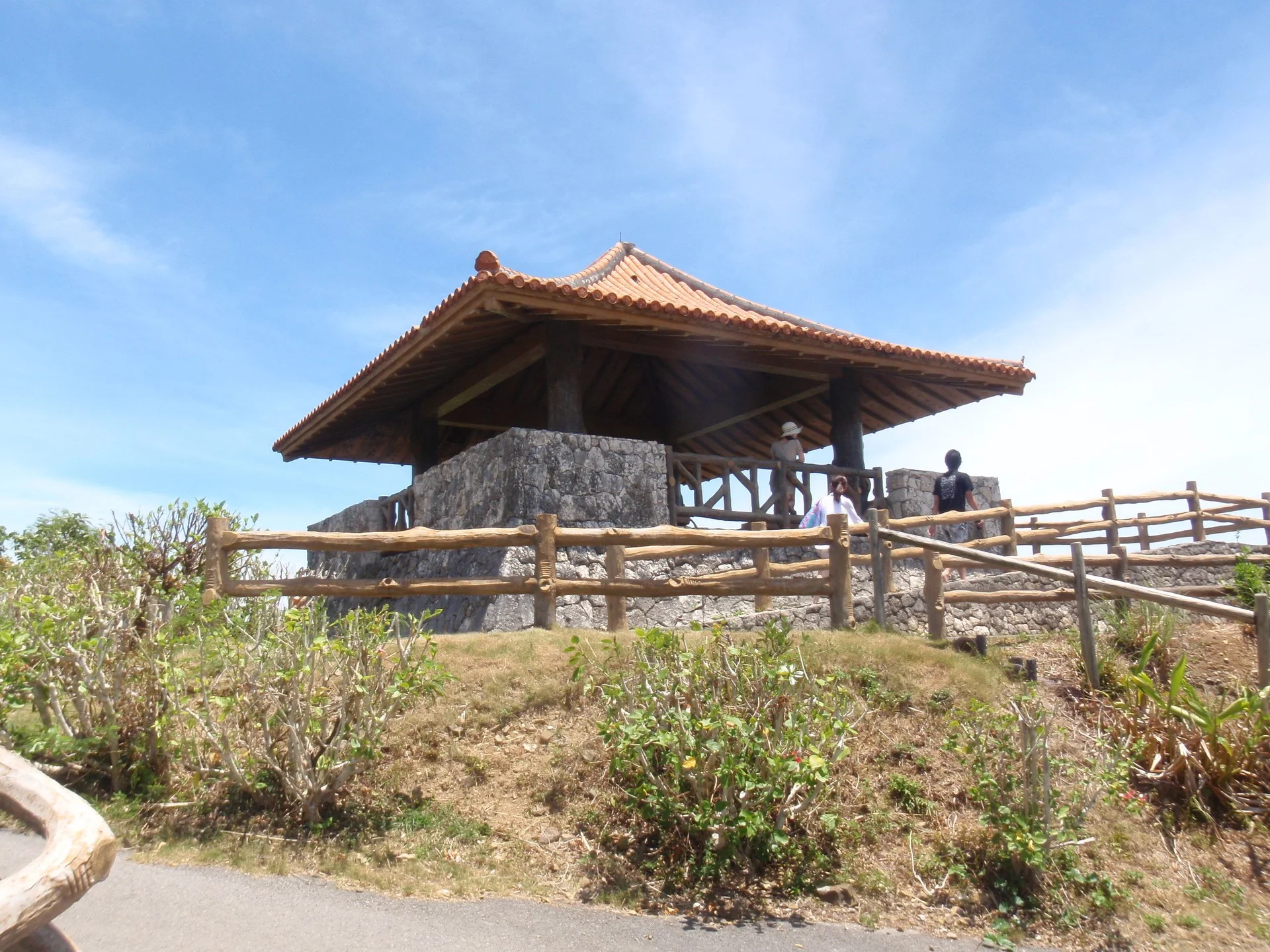 Tamatorizaki Observatory on Ishigaki Island. Once east-coast and northern stops are added, charter time should be planned by actual route rather than attraction count.