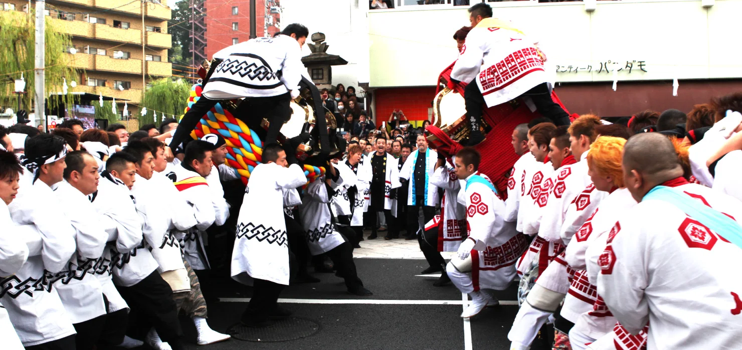 Large mikoshi moving through the Dogo neighborhood during Matsuyama Autumn Festival