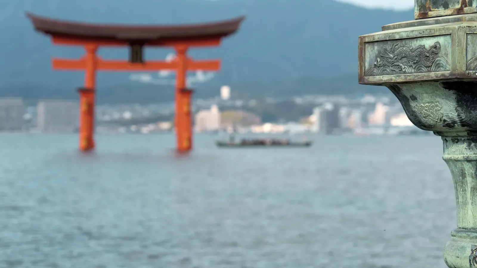 Miyajima from Hiroshima for comparing a station hotel with a Peace Park base and direct sea route
