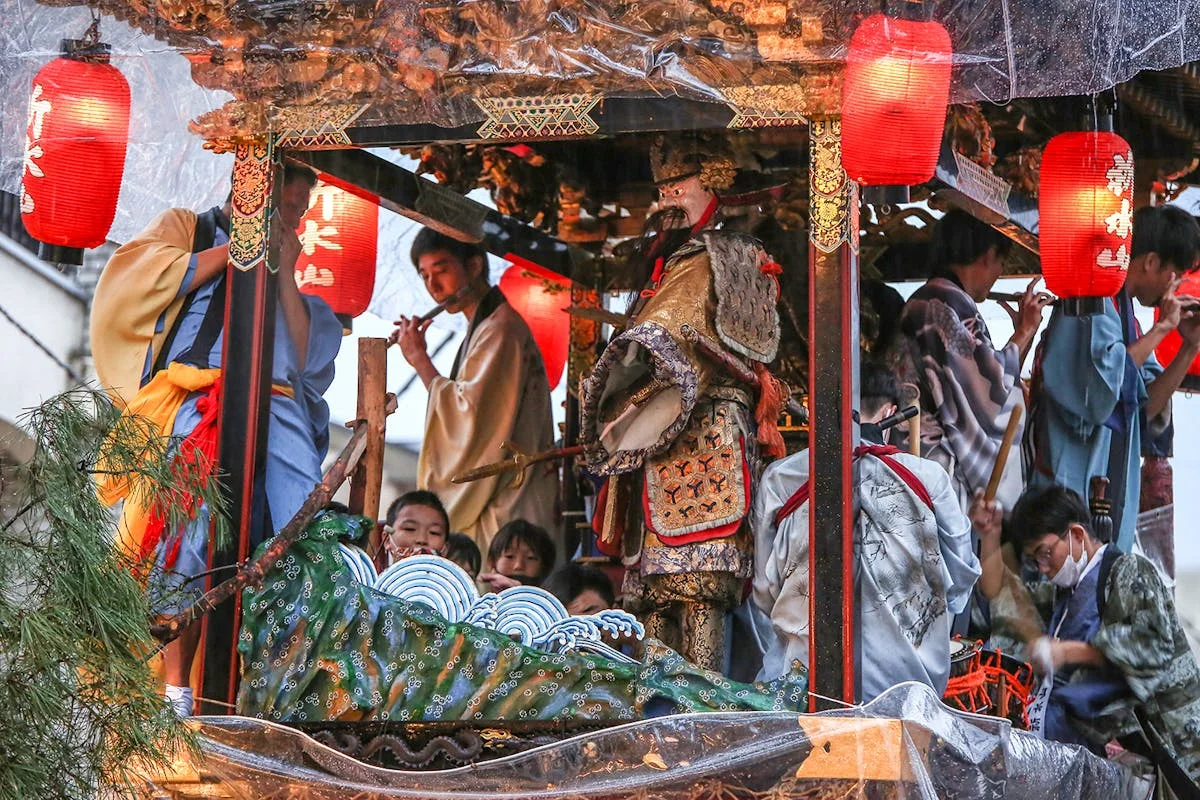 Otsu Matsuri karakuri puppets and musicians on a hikiyama during the main festival
