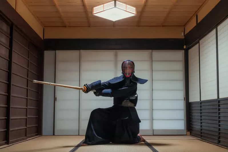Kyoto samurai sword class with participants practising traditional sword movements