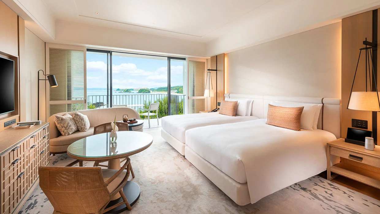 Halekulani Okinawa guest room for a honeymoon comparing Beach Front Wing and Sunset Wing
