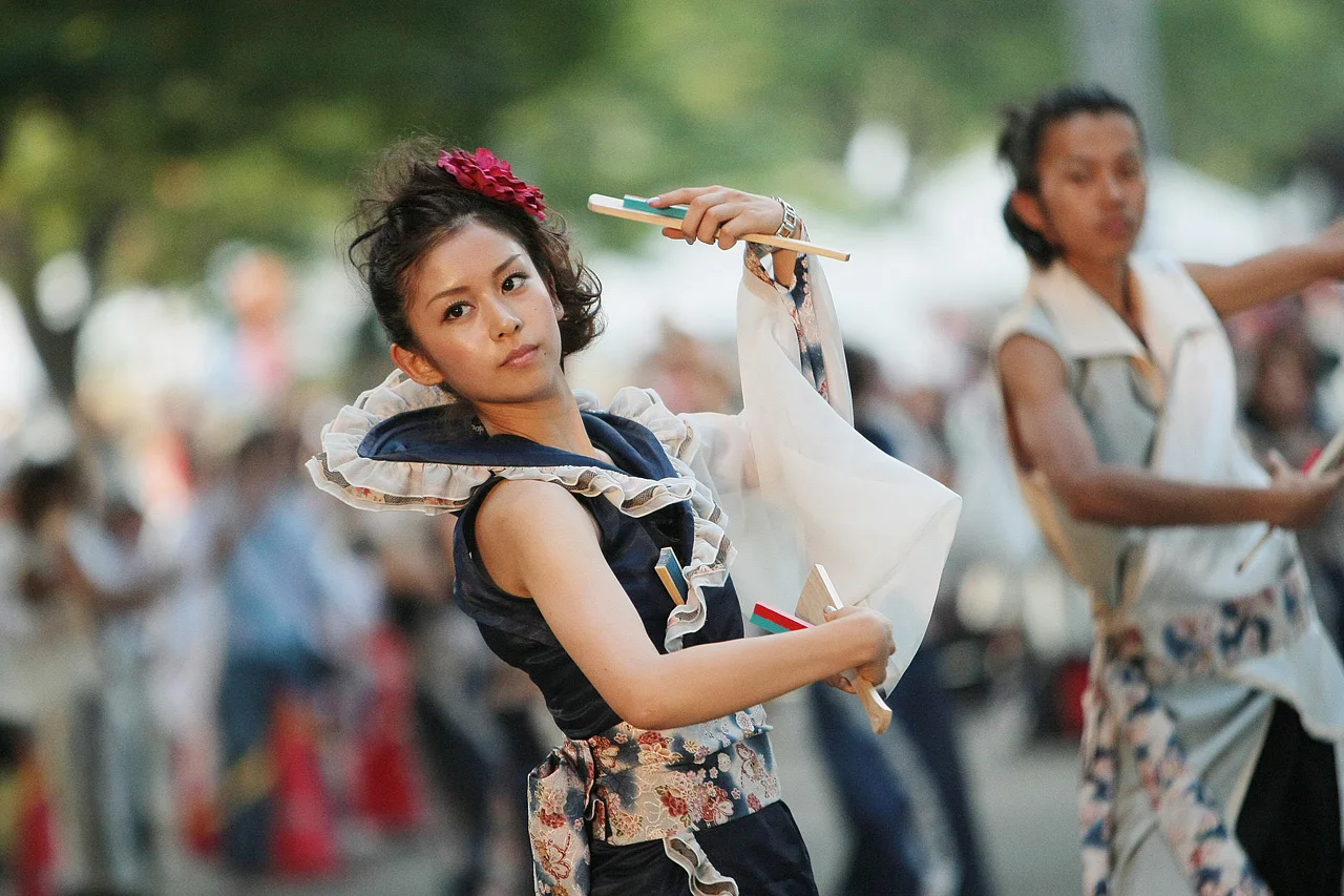 Super Yosakoi dancers wearing coordinated festival costumes in Harajuku