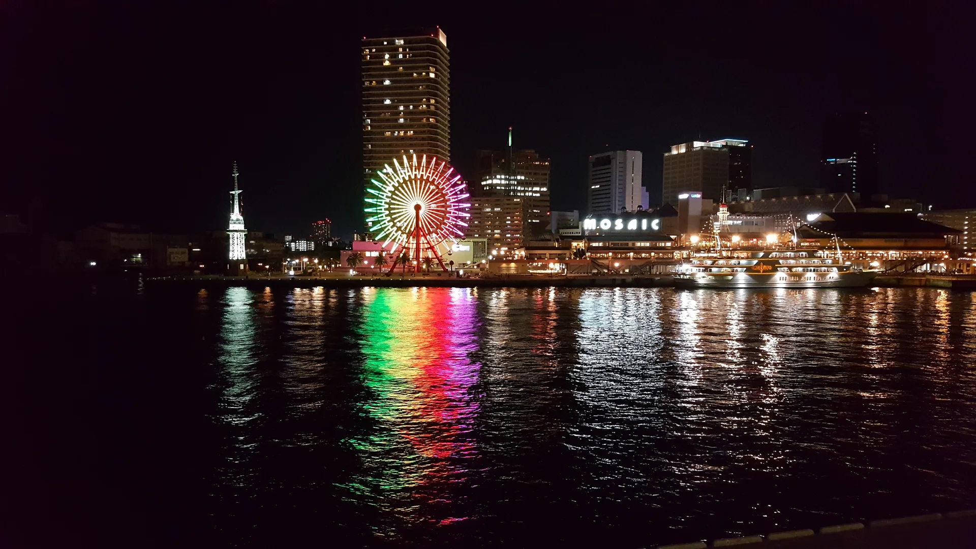 Kobe Harborland waterfront at night; the premium Osaka week deliberately keeps one low-commitment day for recovery and flexibility