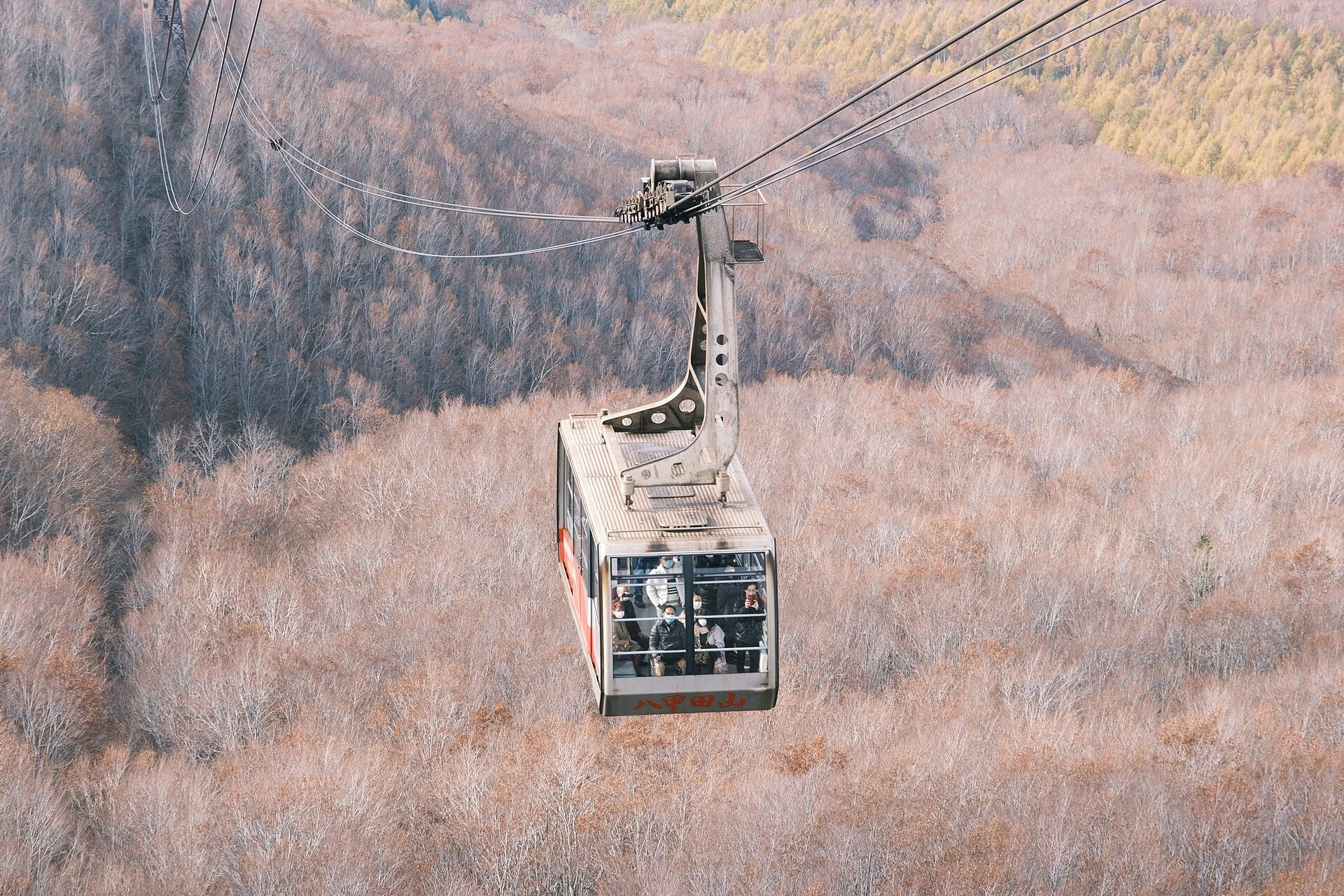 Hakkoda Ropeway above autumn forest during the foliage season