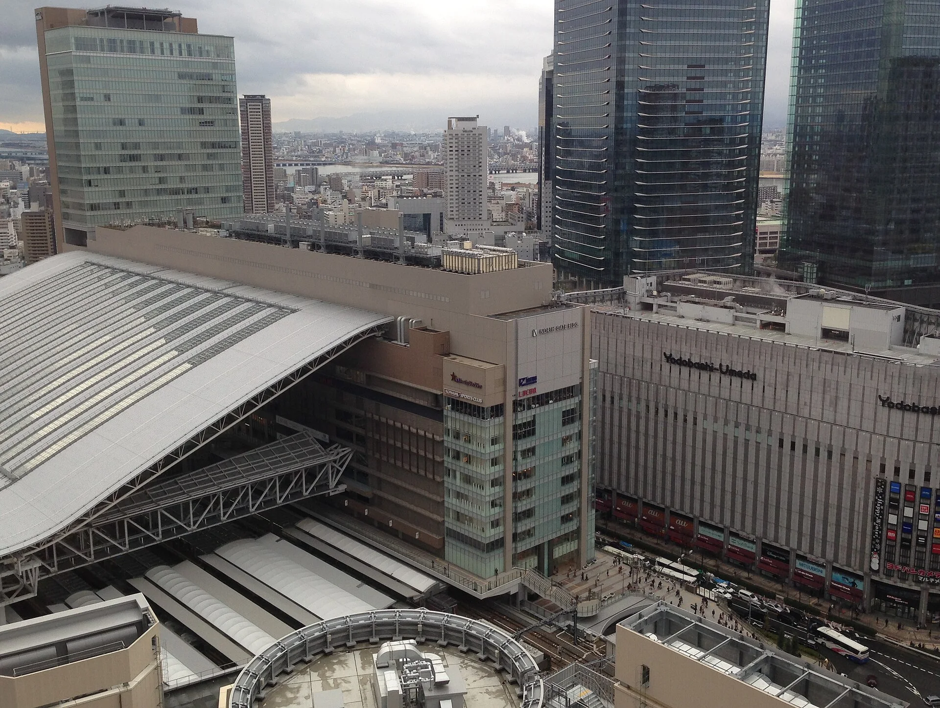 Osaka Station in August, where luggage and transfers amplify the effect of 33°C summer heat