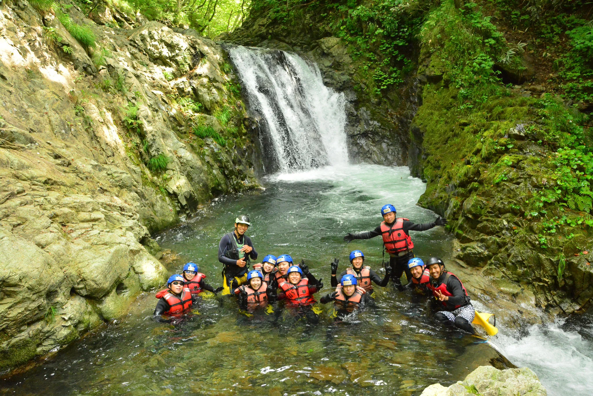Canyoning at Niseko Hanazono; participants jump, slide and swim through a natural canyon, with greater physical demand than standard rafting.