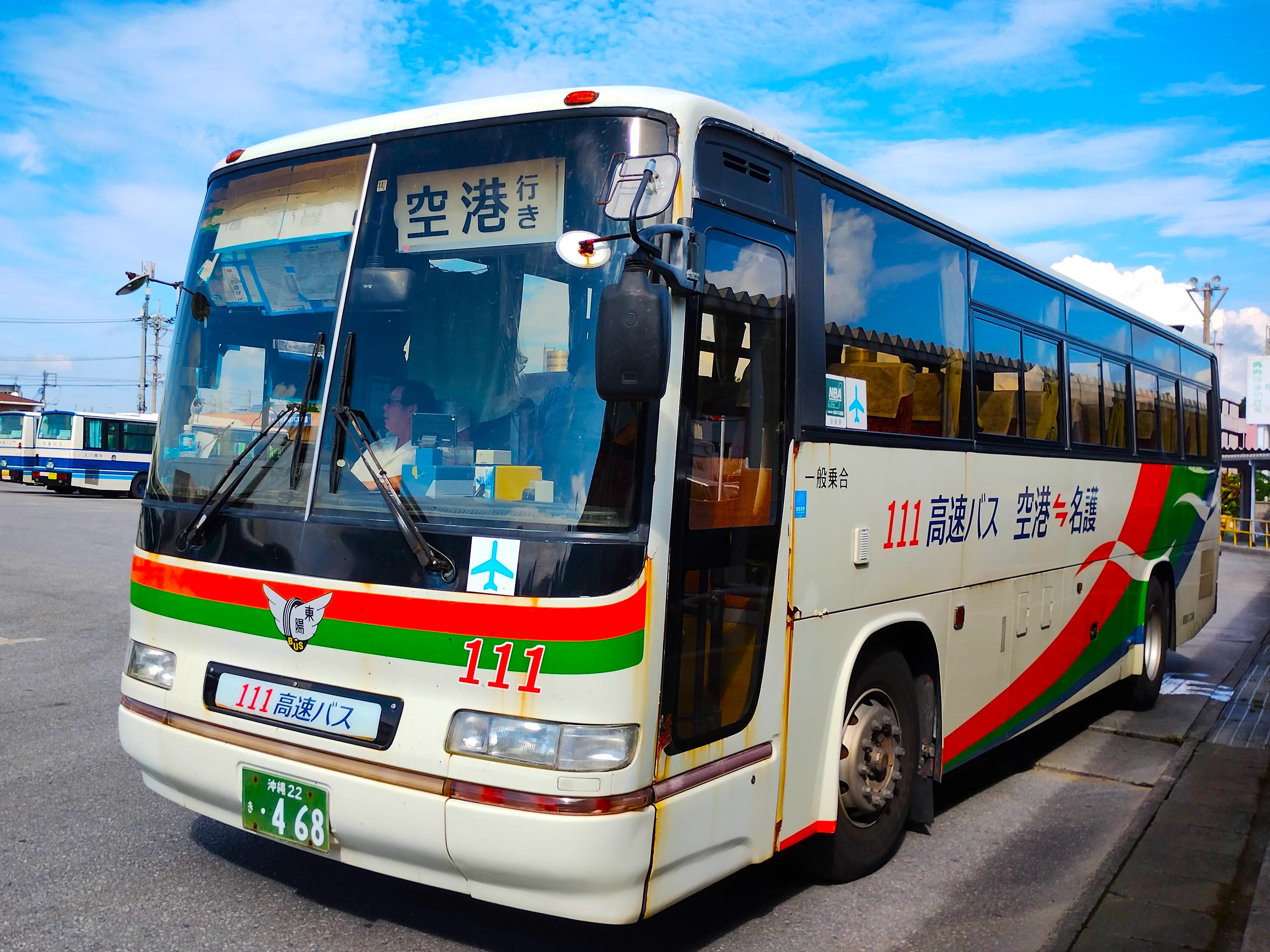 Okinawa coach bus showing why a single northern destination can work without a car