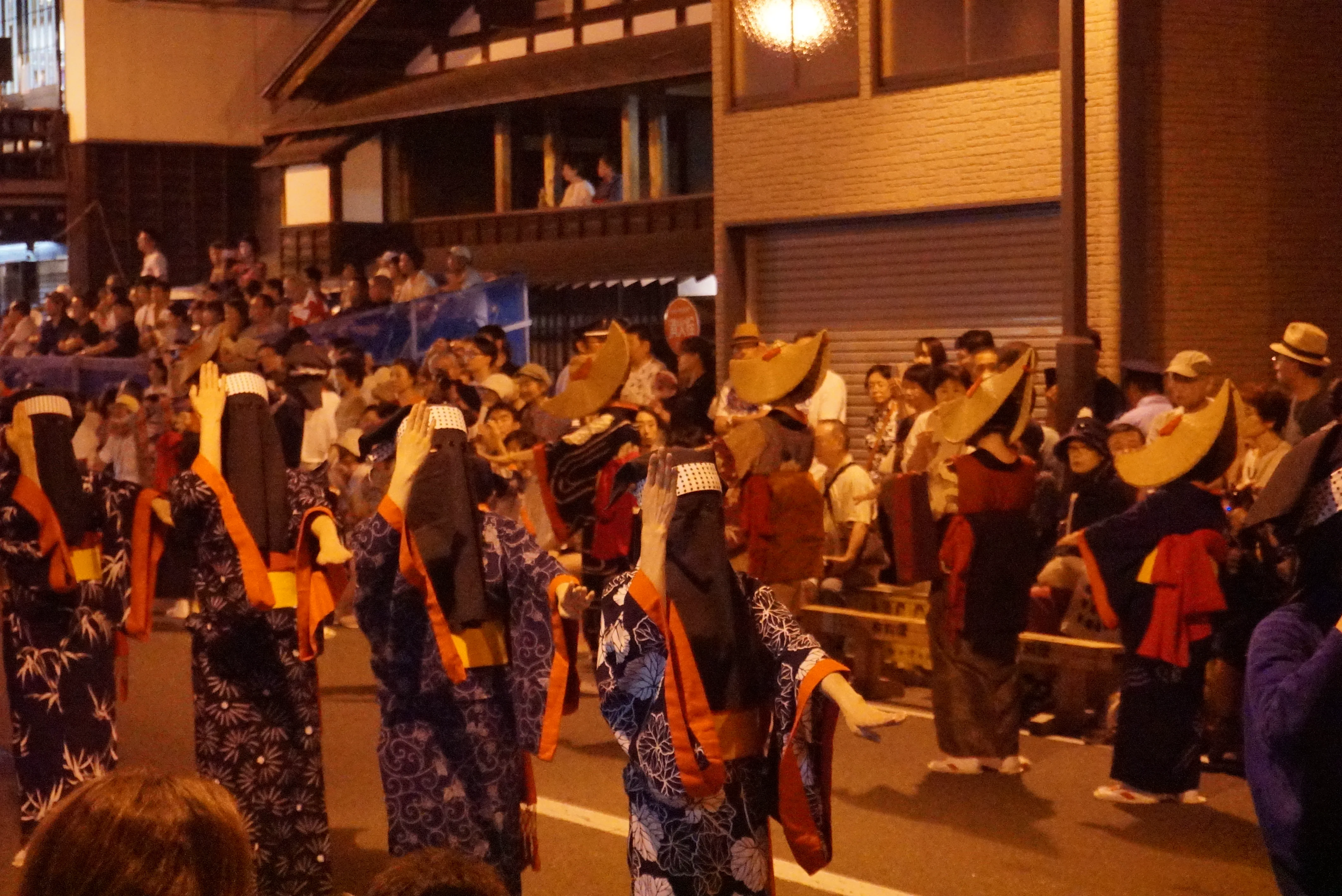Adult dancers at Nishimonai Bon Odori at night during the post-9 PM viewing period