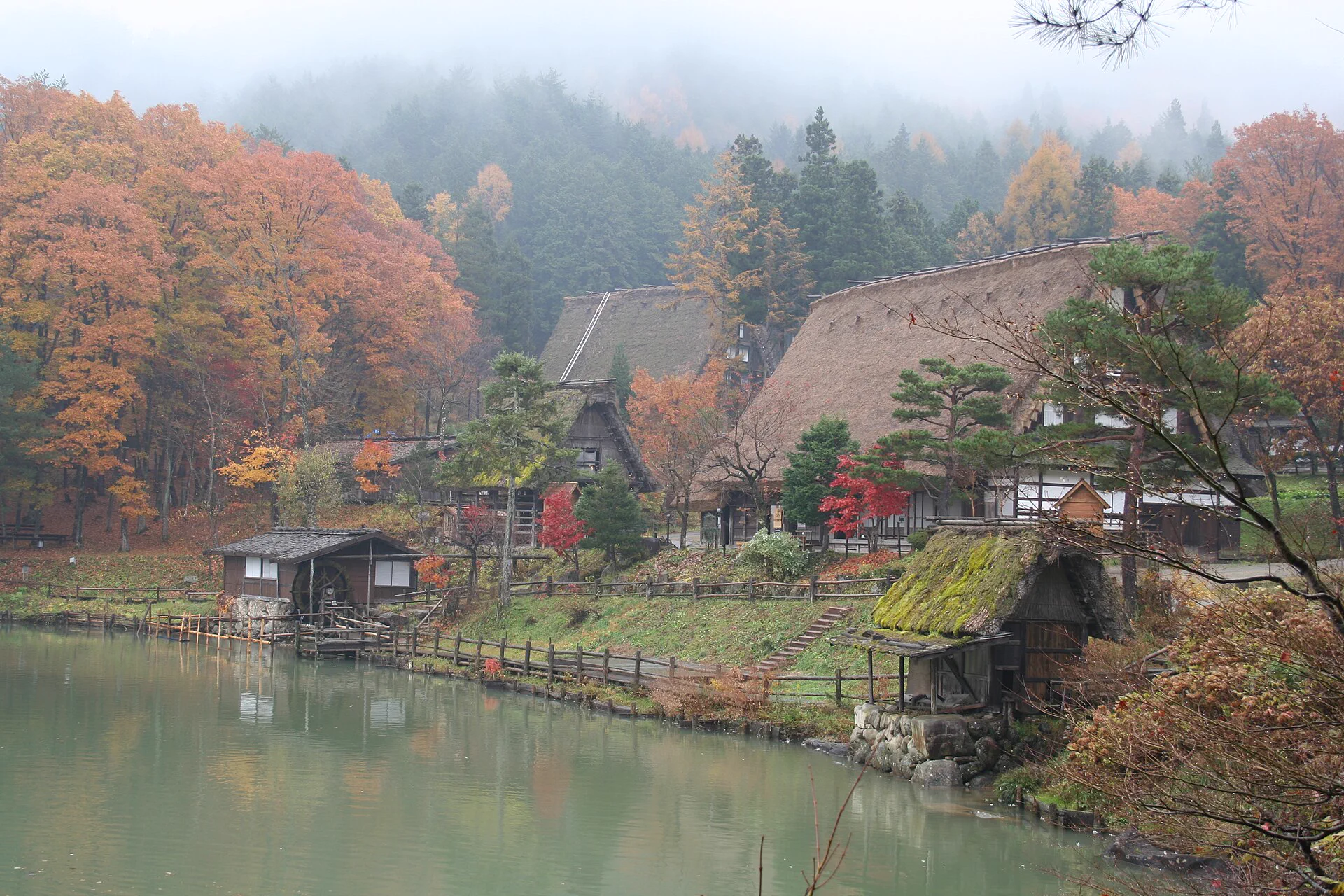 Hida Folk Village farmhouses and autumn foliage near Takayama