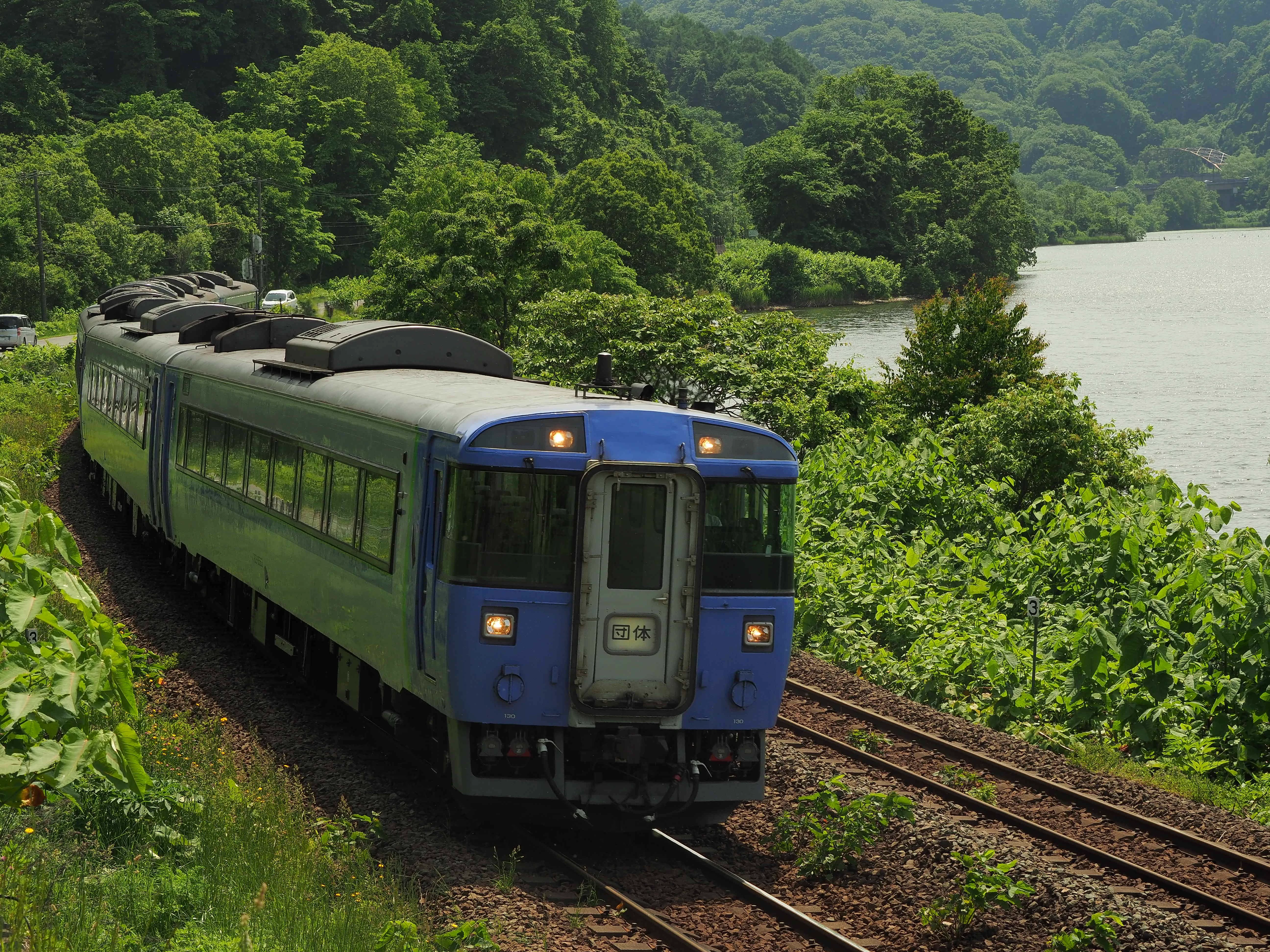 JR Hokkaido train near Onuma illustrating station-based planning