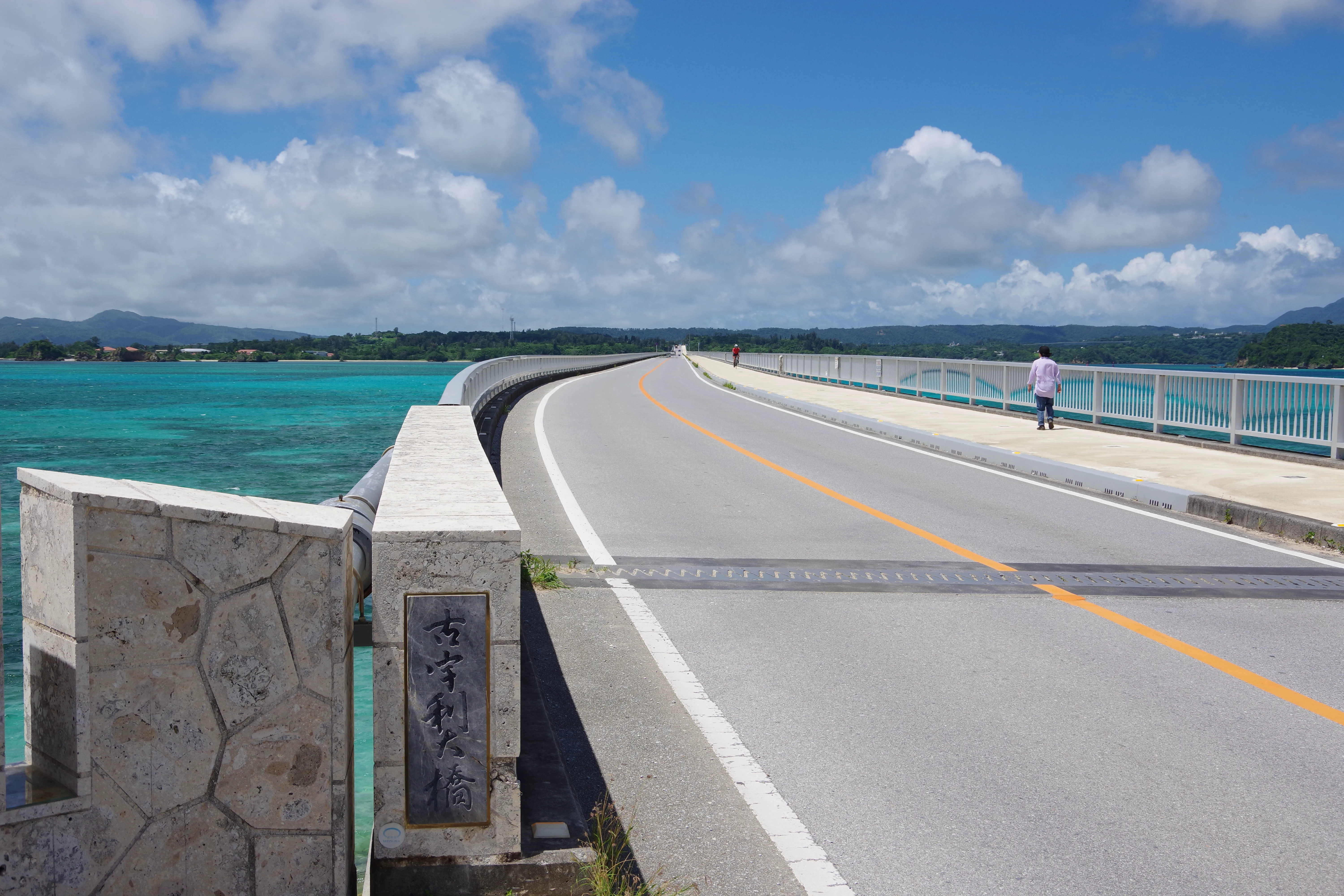 Kouri Bridge in Okinawa: February is much milder than mainland Japan, so a light windproof layer is usually more useful than a heavy coat.