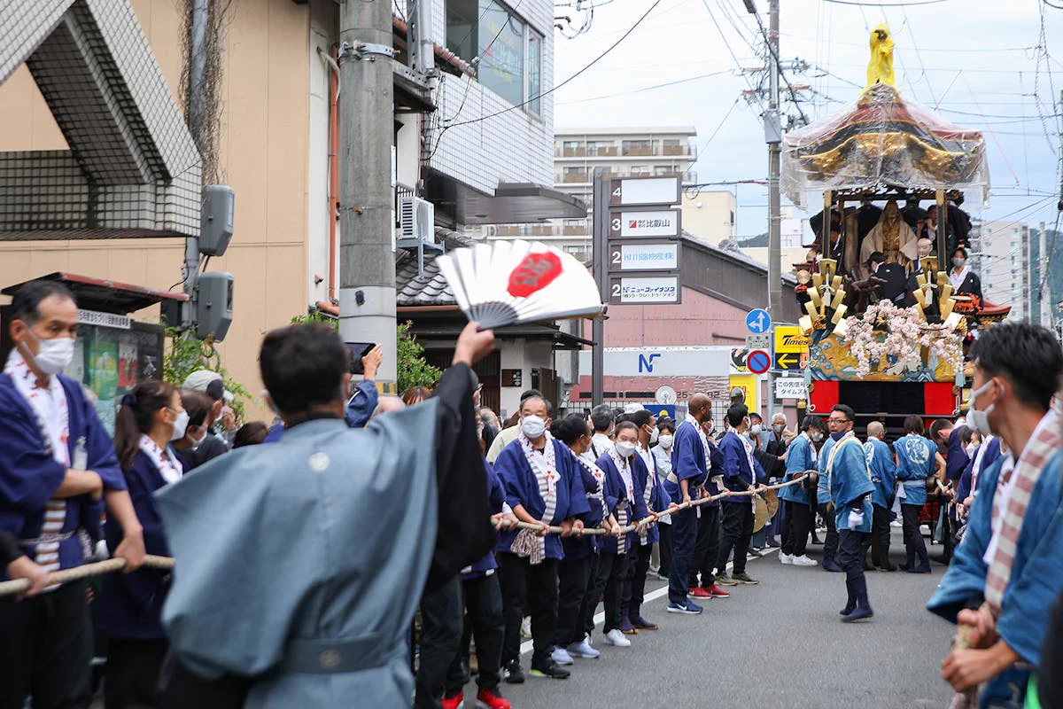 Otsu Matsuri main procession with pullers guiding a hikiyama through central Otsu