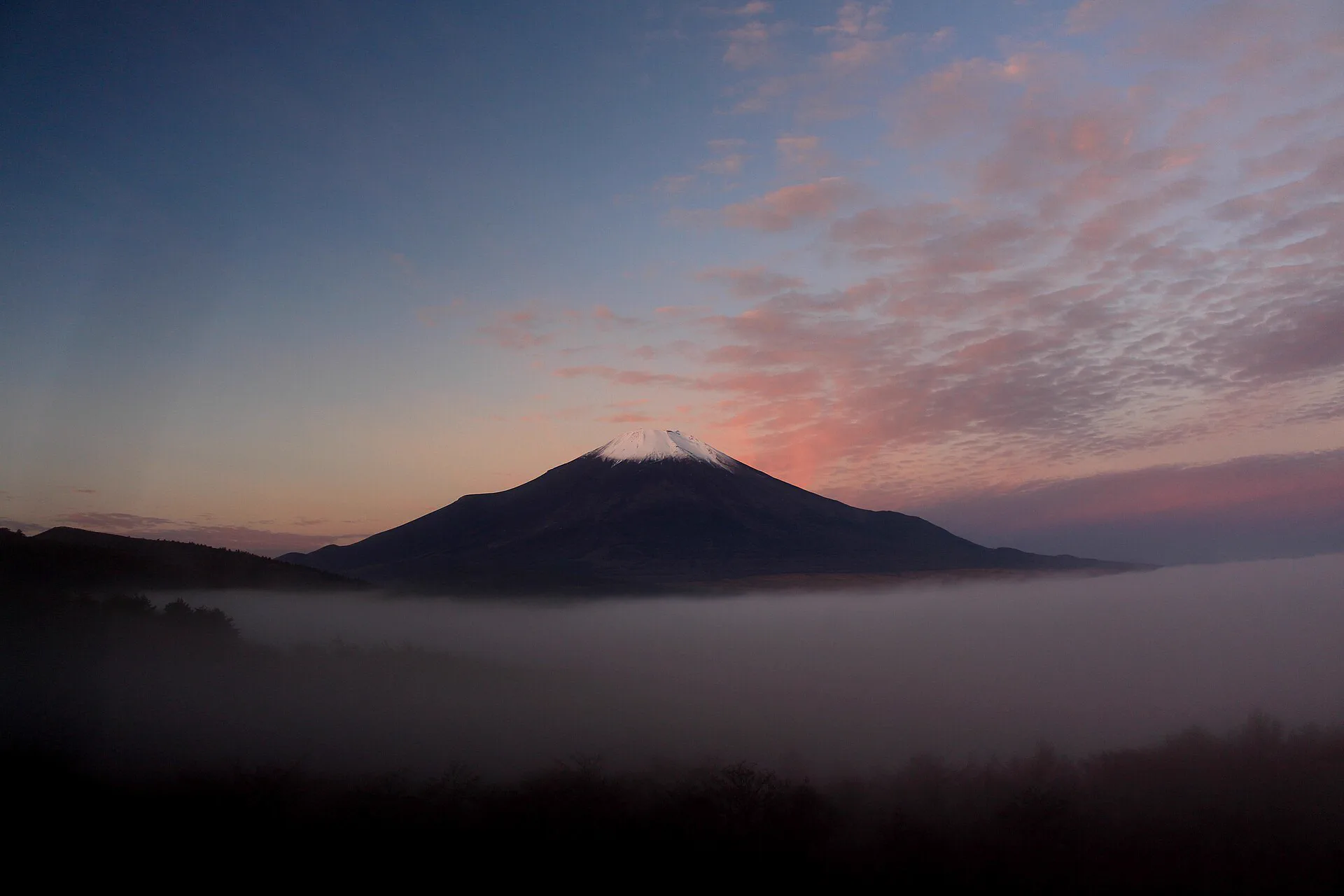 Fog over Lake Yamanaka and Mount Fuji, showing why both lake stays need a weather backup
