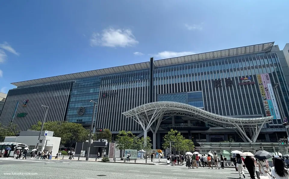 Hakata Station in Fukuoka in August, where summer heat still needs a rain and wet-shoe backup