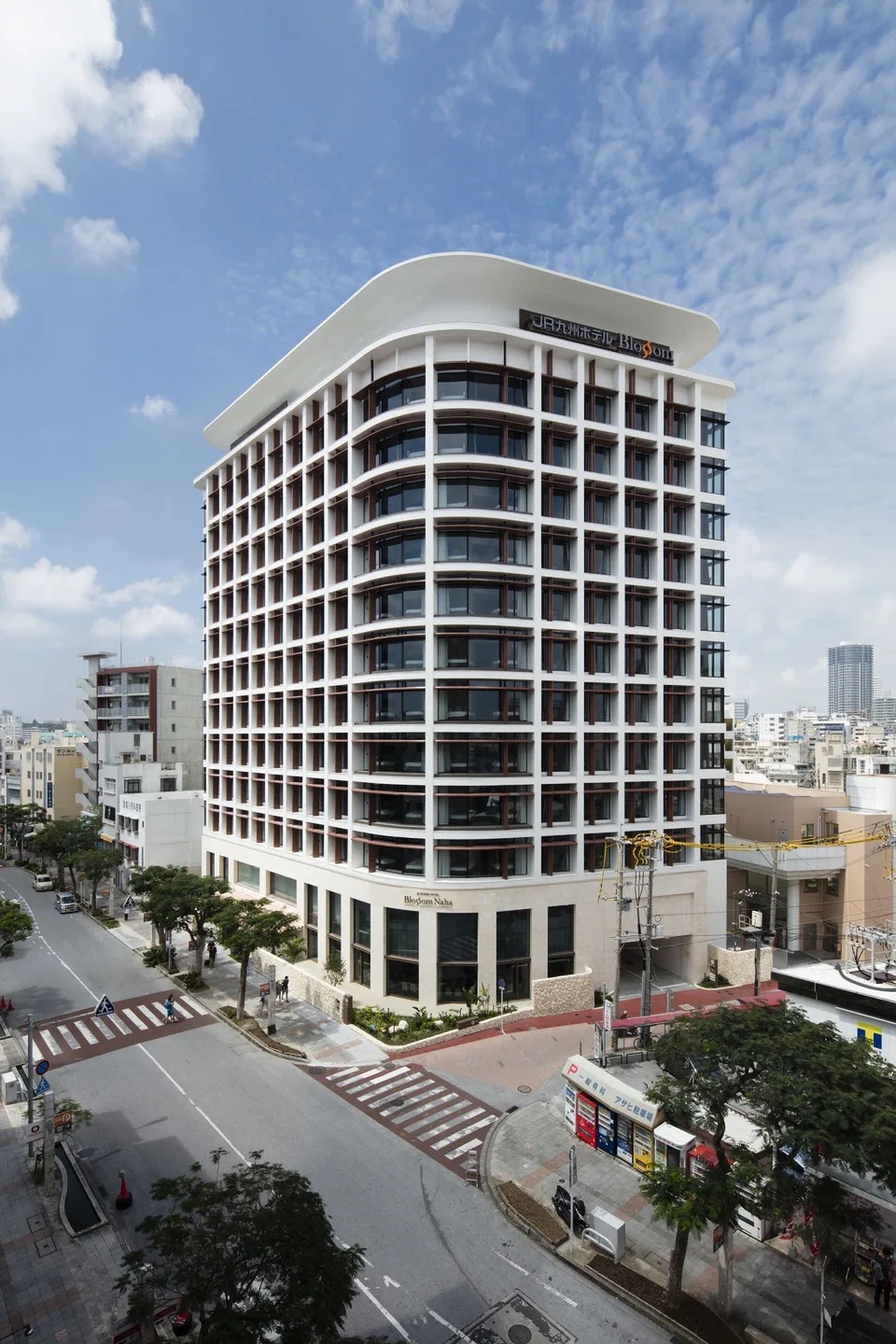 JR Kyushu Hotel Blossom Naha exterior for comparing a family room with two Twin rooms for four adults in Okinawa