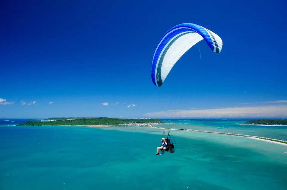 Okinawa marine and aerial activities: on an Onna resort day, choose one main weather-dependent experience and protect recovery time.